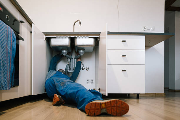 Professional Drain Cleaning technician working in Palo, MI